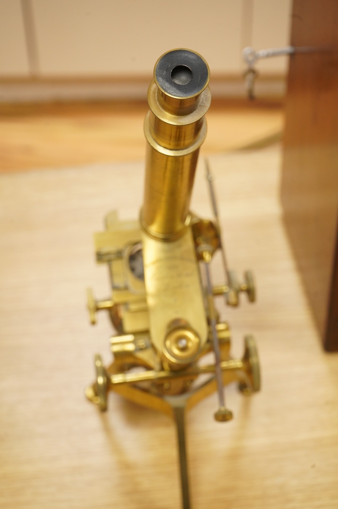 A fine mid 19th century brass compound monocular microscope, by Powell and Lealand, 170, Euston Road, London, dated 1869, mahogany cased, together with a mahogany cased accessory box, containing - 7 objectives, 4 Leiberk